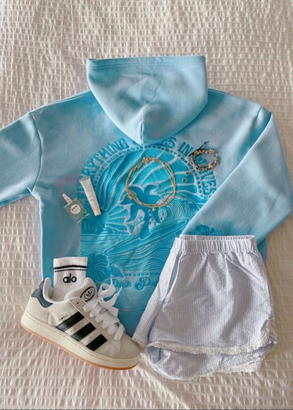 "Everything Comes in Waves” Hoodie in Blue